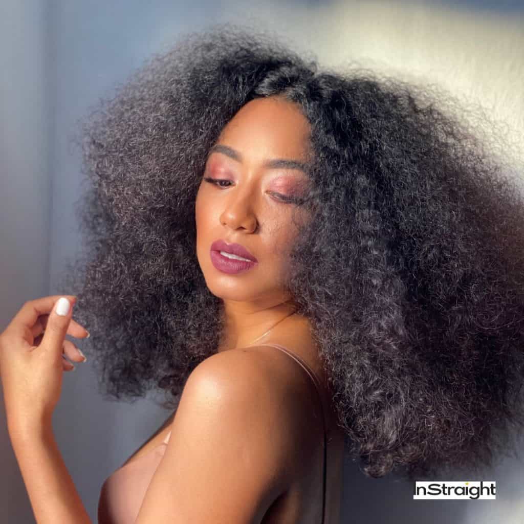 woman with natural curly hair but are keratin treatments good for curly hair?